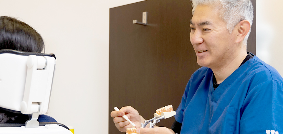 丁寧な診療を行う院長